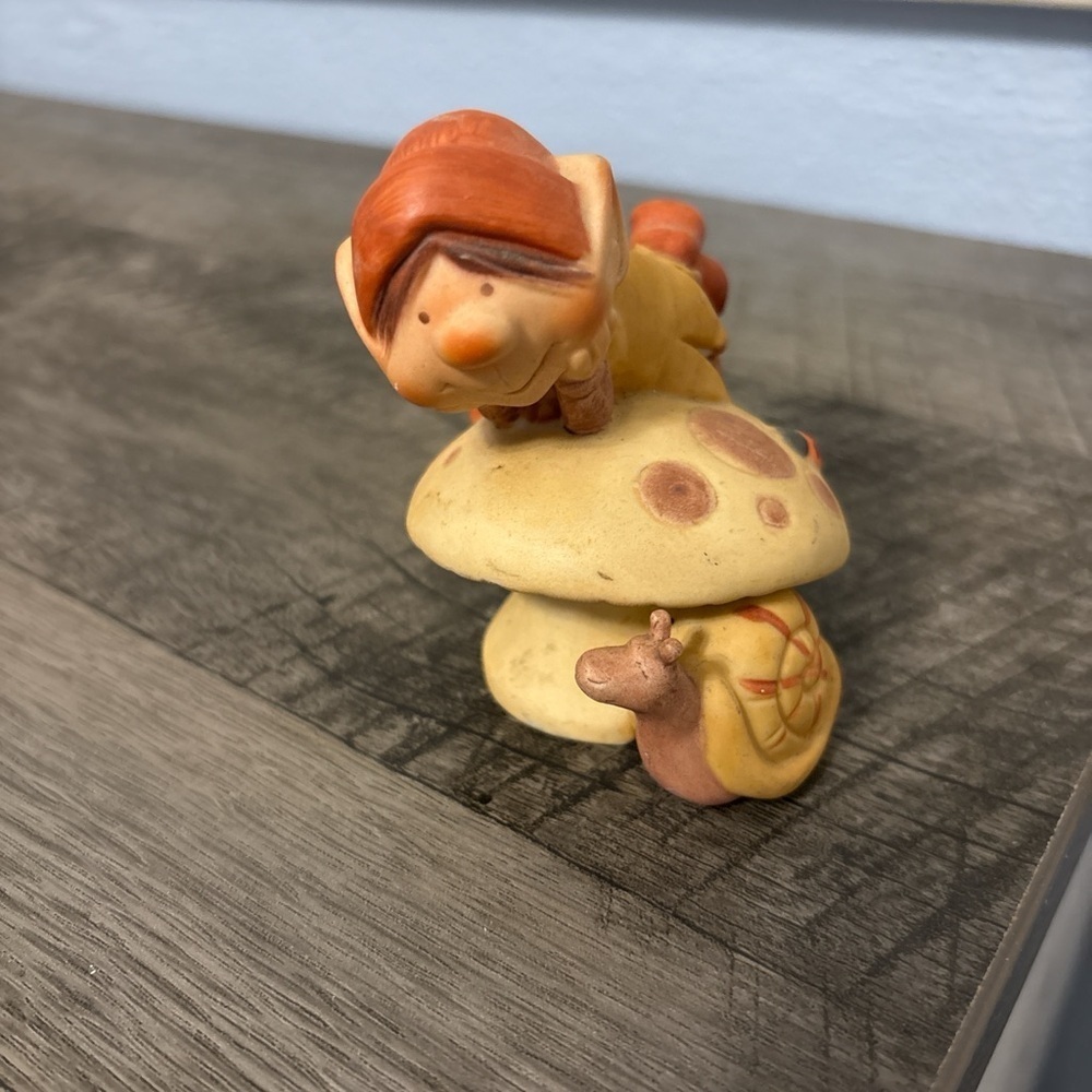 Vintage Elf figurine, Times of Tranquility, from 1973. Elf sitting on a mushroom